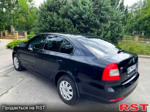 Черный Шкода Октавия, объемом двигателя 1.6 л и пробегом 127 тыс. км за 7600 $, фото 5 на Automoto.ua