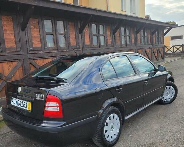 Черный Шкода Октавия, объемом двигателя 1.6 л и пробегом 197 тыс. км за 7150 $, фото 17 на Automoto.ua