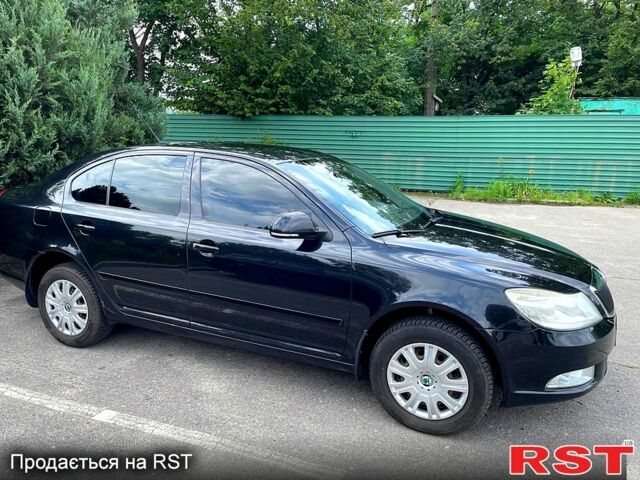 Черный Шкода Октавия, объемом двигателя 1.6 л и пробегом 127 тыс. км за 7600 $, фото 1 на Automoto.ua