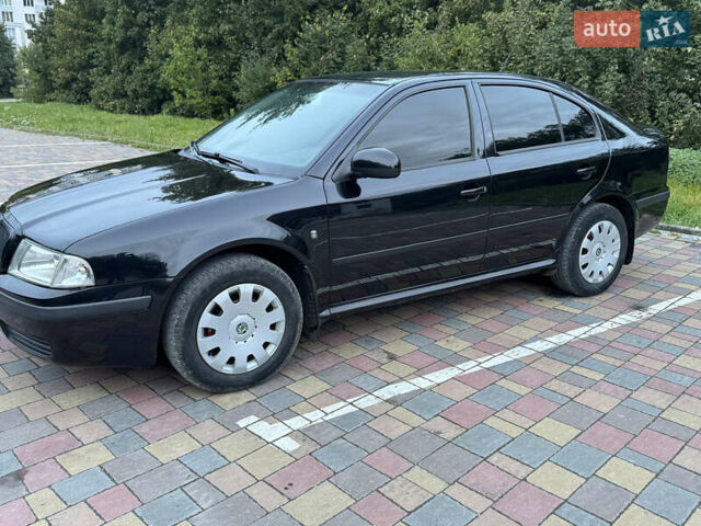 Черный Шкода Октавия, объемом двигателя 1.6 л и пробегом 225 тыс. км за 5650 $, фото 7 на Automoto.ua