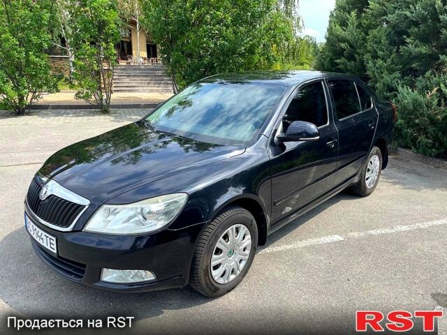 Черный Шкода Октавия, объемом двигателя 1.6 л и пробегом 127 тыс. км за 7600 $, фото 2 на Automoto.ua