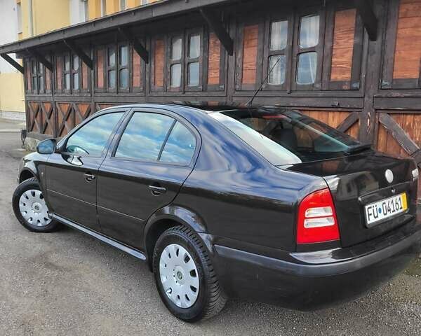 Черный Шкода Октавия, объемом двигателя 1.6 л и пробегом 197 тыс. км за 7150 $, фото 9 на Automoto.ua