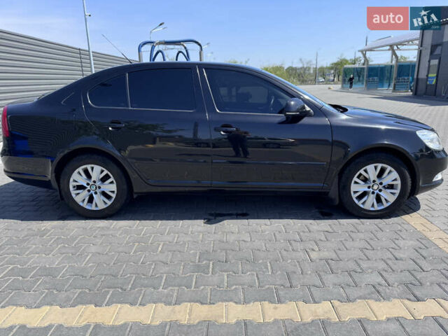 Черный Шкода Октавия, объемом двигателя 1.4 л и пробегом 206 тыс. км за 6600 $, фото 6 на Automoto.ua