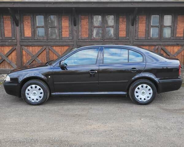 Черный Шкода Октавия, объемом двигателя 1.6 л и пробегом 197 тыс. км за 7150 $, фото 5 на Automoto.ua