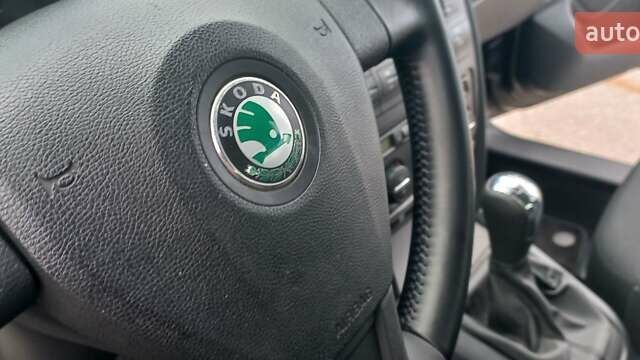 Черный Шкода Октавия, объемом двигателя 1.6 л и пробегом 145 тыс. км за 9250 $, фото 50 на Automoto.ua