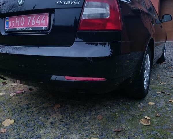 Черный Шкода Октавия, объемом двигателя 1.4 л и пробегом 165 тыс. км за 8250 $, фото 1 на Automoto.ua