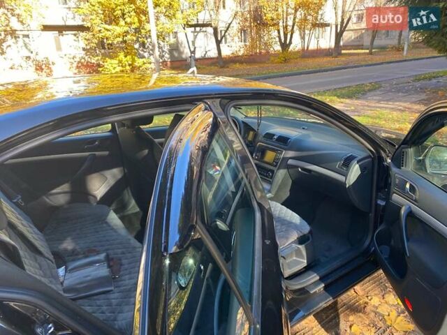 Чорний Шкода Октавія, об'ємом двигуна 1.8 л та пробігом 278 тис. км за 9100 $, фото 5 на Automoto.ua