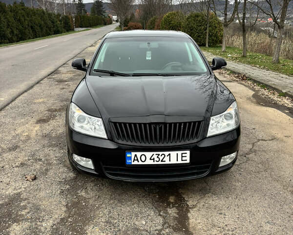 Чорний Шкода Октавія, об'ємом двигуна 1.6 л та пробігом 217 тис. км за 7199 $, фото 2 на Automoto.ua