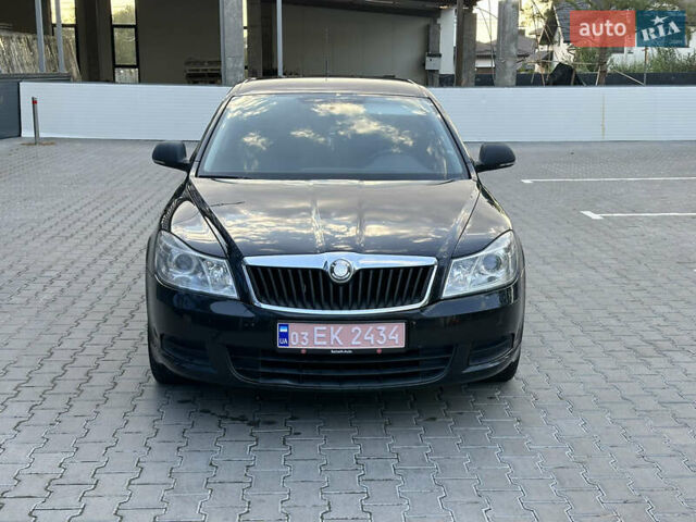 Черный Шкода Октавия, объемом двигателя 1.6 л и пробегом 178 тыс. км за 7800 $, фото 1 на Automoto.ua