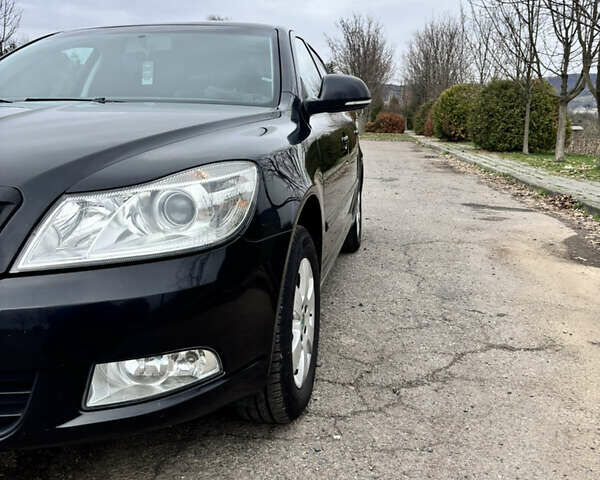 Чорний Шкода Октавія, об'ємом двигуна 1.6 л та пробігом 217 тис. км за 7199 $, фото 9 на Automoto.ua