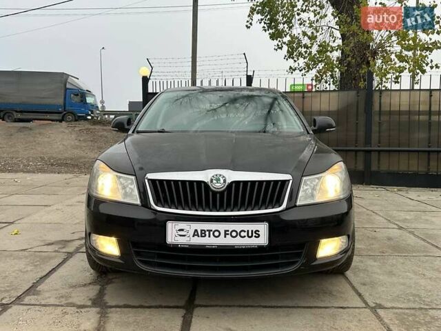 Черный Шкода Октавия, объемом двигателя 1.8 л и пробегом 206 тыс. км за 7490 $, фото 1 на Automoto.ua