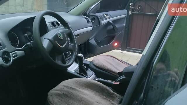 Чорний Шкода Октавія, об'ємом двигуна 1.8 л та пробігом 198 тис. км за 6500 $, фото 1 на Automoto.ua