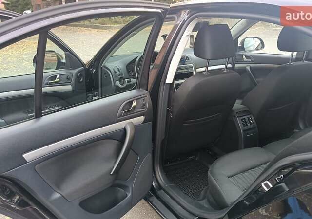 Черный Шкода Октавия, объемом двигателя 1.4 л и пробегом 240 тыс. км за 8200 $, фото 5 на Automoto.ua