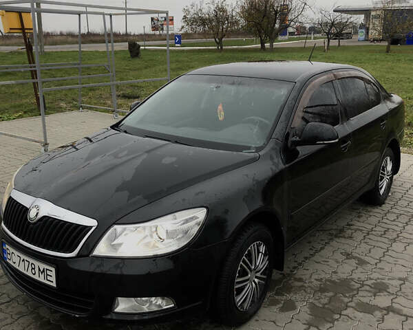 Черный Шкода Октавия, объемом двигателя 1.6 л и пробегом 215 тыс. км за 8200 $, фото 2 на Automoto.ua