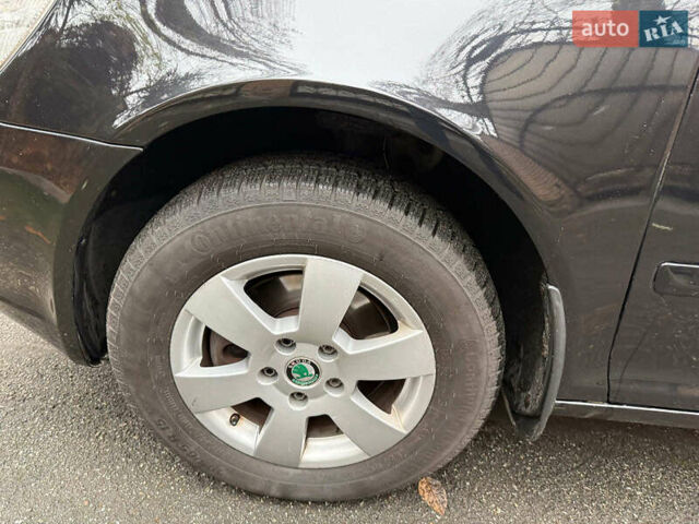 Чорний Шкода Октавія, об'ємом двигуна 2 л та пробігом 210 тис. км за 10490 $, фото 9 на Automoto.ua