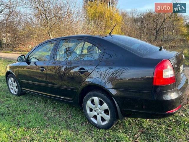 Черный Шкода Октавия, объемом двигателя 1.8 л и пробегом 328 тыс. км за 6500 $, фото 11 на Automoto.ua