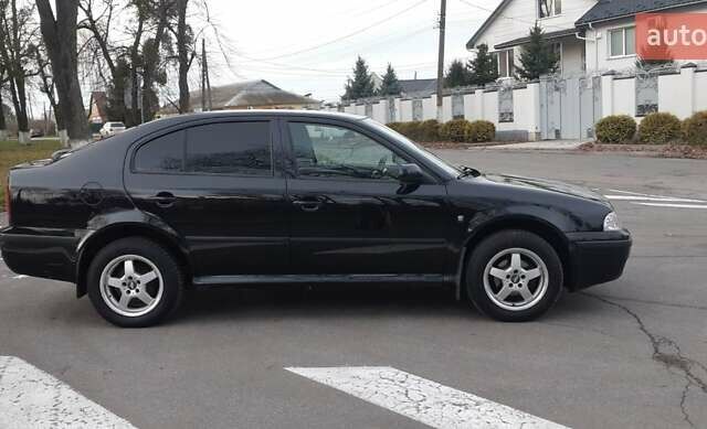 Чорний Шкода Октавія, об'ємом двигуна 1.6 л та пробігом 259 тис. км за 6700 $, фото 4 на Automoto.ua