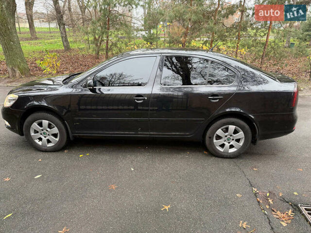 Чорний Шкода Октавія, об'ємом двигуна 2 л та пробігом 210 тис. км за 10490 $, фото 8 на Automoto.ua