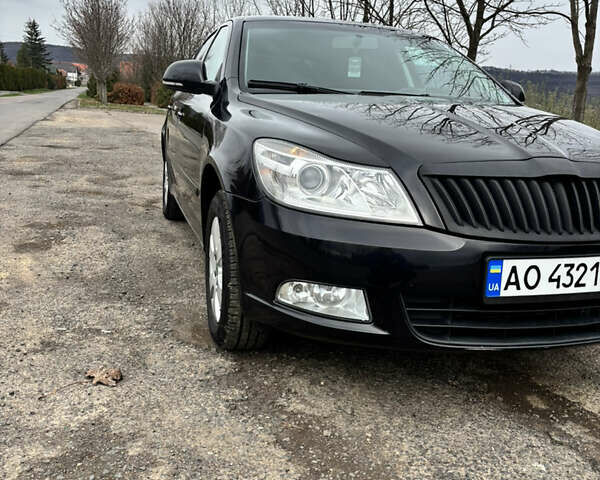 Чорний Шкода Октавія, об'ємом двигуна 1.6 л та пробігом 217 тис. км за 7199 $, фото 8 на Automoto.ua