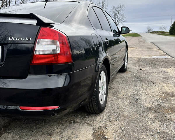 Чорний Шкода Октавія, об'ємом двигуна 1.6 л та пробігом 217 тис. км за 7199 $, фото 7 на Automoto.ua