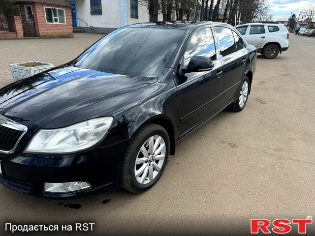 Черный Шкода Октавия, объемом двигателя 1.4 л и пробегом 245 тыс. км за 6900 $, фото 1 на Automoto.ua