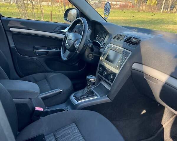 Черный Шкода Октавия, объемом двигателя 1.8 л и пробегом 328 тыс. км за 6500 $, фото 14 на Automoto.ua