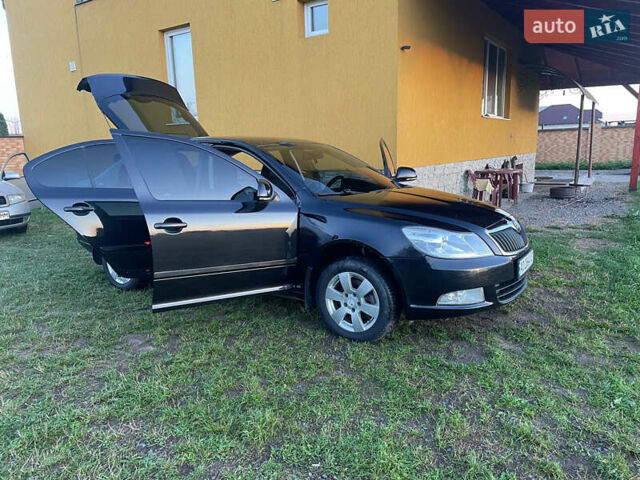 Черный Шкода Октавия, объемом двигателя 1.8 л и пробегом 208 тыс. км за 6600 $, фото 4 на Automoto.ua