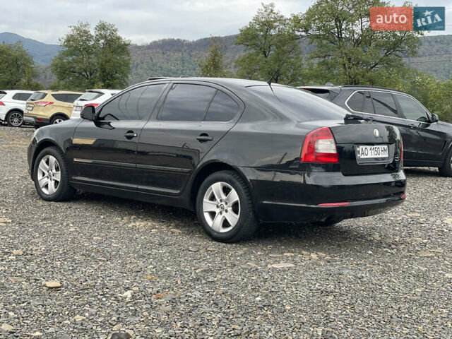 Черный Шкода Октавия, объемом двигателя 1.6 л и пробегом 300 тыс. км за 8000 $, фото 2 на Automoto.ua
