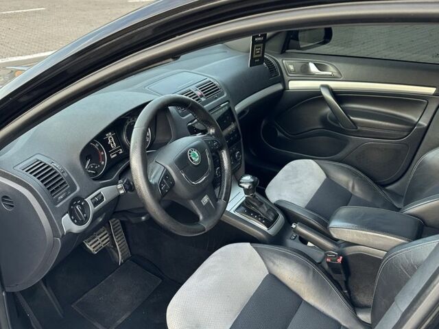 Чорний Шкода Октавія, об'ємом двигуна 2 л та пробігом 219 тис. км за 11000 $, фото 4 на Automoto.ua