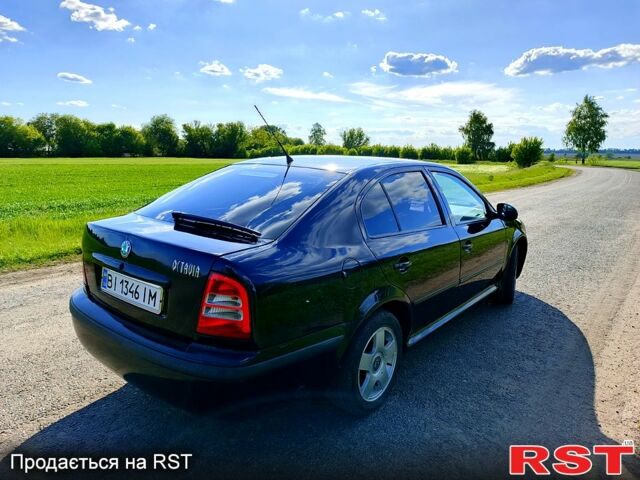 Черный Шкода Октавия, объемом двигателя 1.6 л и пробегом 245 тыс. км за 5500 $, фото 1 на Automoto.ua