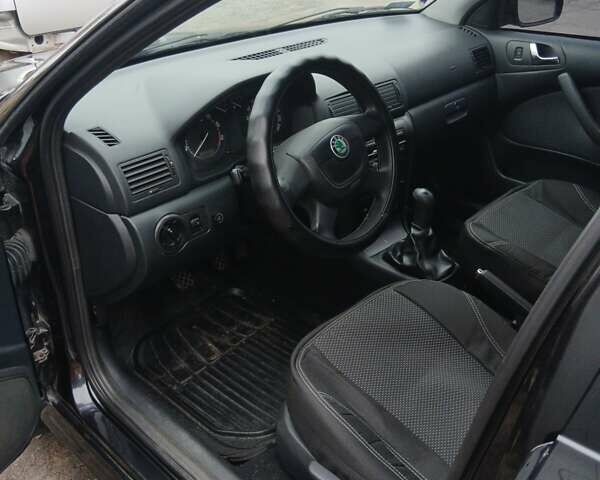 Чорний Шкода Октавія, об'ємом двигуна 1.6 л та пробігом 126 тис. км за 6600 $, фото 5 на Automoto.ua