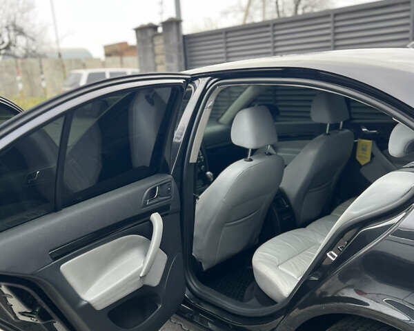 Чорний Шкода Октавія, об'ємом двигуна 2 л та пробігом 320 тис. км за 7800 $, фото 6 на Automoto.ua