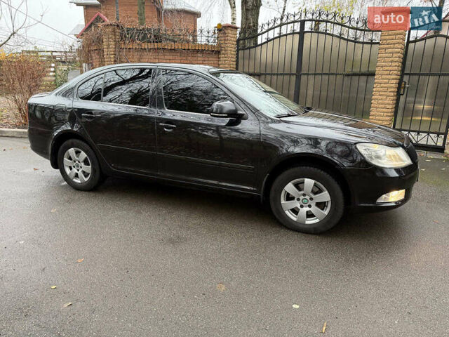 Чорний Шкода Октавія, об'ємом двигуна 2 л та пробігом 210 тис. км за 10490 $, фото 3 на Automoto.ua