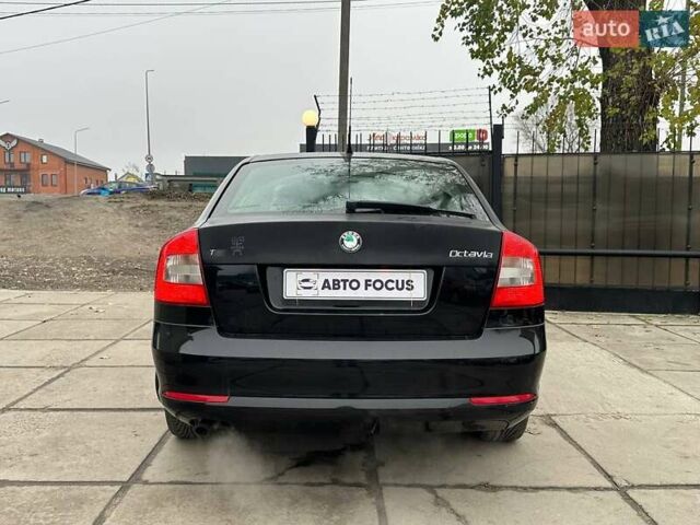 Черный Шкода Октавия, объемом двигателя 1.8 л и пробегом 206 тыс. км за 7490 $, фото 5 на Automoto.ua