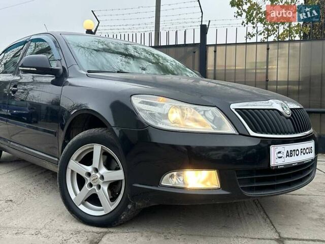 Черный Шкода Октавия, объемом двигателя 1.8 л и пробегом 206 тыс. км за 7490 $, фото 3 на Automoto.ua