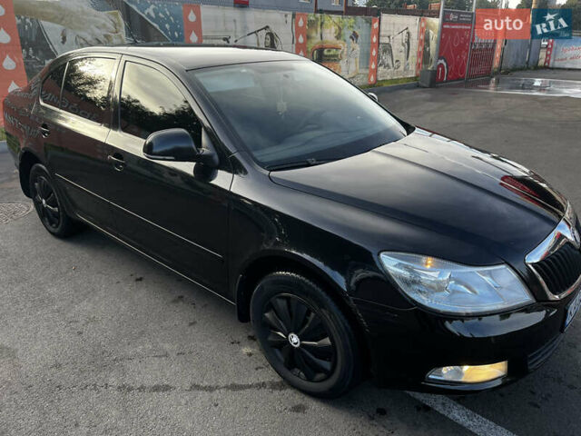 Шкода Октавія 2010 у Києві на Automoto.ua Чорний Шкода Октавія, об'ємом двигуна 1.8 л та пробігом 185 тис. км за 6900 $, фото 26 на Automoto.ua