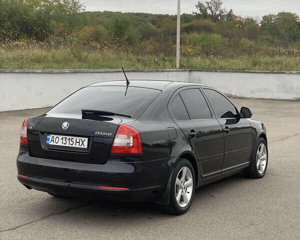Чорний Шкода Октавія, об'ємом двигуна 1.6 л та пробігом 298 тис. км за 7999 $, фото 4 на Automoto.ua