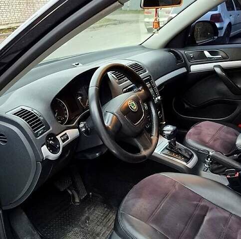 Чорний Шкода Октавія, об'ємом двигуна 2 л та пробігом 232 тис. км за 9800 $, фото 9 на Automoto.ua