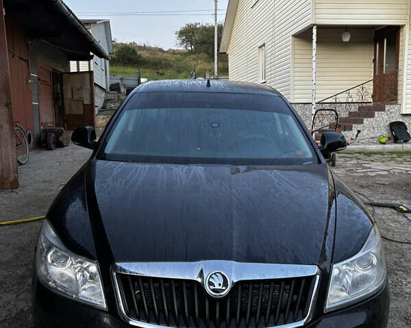 Черный Шкода Октавия, объемом двигателя 1.6 л и пробегом 140 тыс. км за 8000 $, фото 5 на Automoto.ua