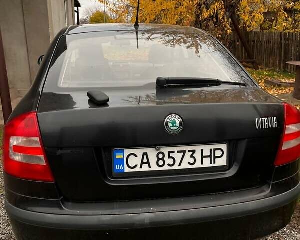 Черный Шкода Октавия, объемом двигателя 1.6 л и пробегом 204 тыс. км за 7800 $, фото 5 на Automoto.ua