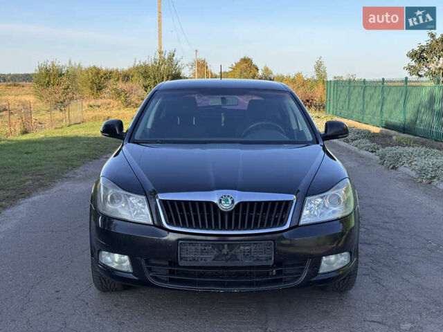 Чорний Шкода Октавія, об'ємом двигуна 1.6 л та пробігом 267 тис. км за 7300 $, фото 1 на Automoto.ua