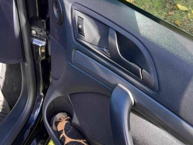 Черный Шкода Октавия, объемом двигателя 1.6 л и пробегом 240 тыс. км за 8000 $, фото 2 на Automoto.ua