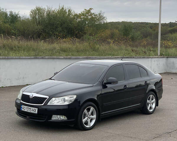 Чорний Шкода Октавія, об'ємом двигуна 1.6 л та пробігом 298 тис. км за 7999 $, фото 1 на Automoto.ua