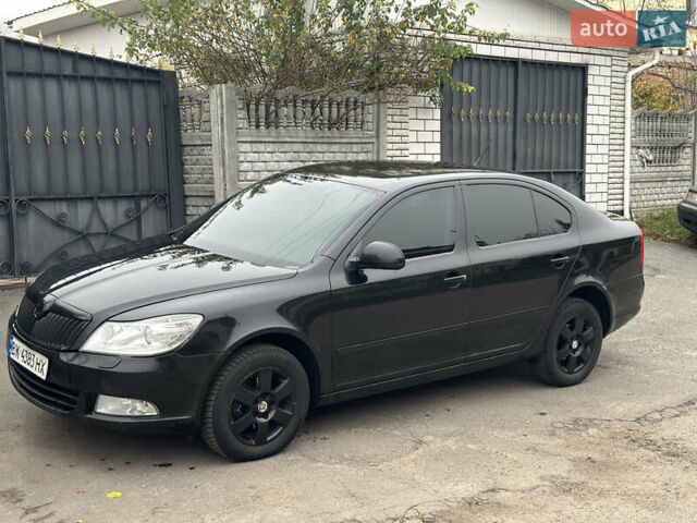 Черный Шкода Октавия, объемом двигателя 1.6 л и пробегом 310 тыс. км за 7500 $, фото 1 на Automoto.ua