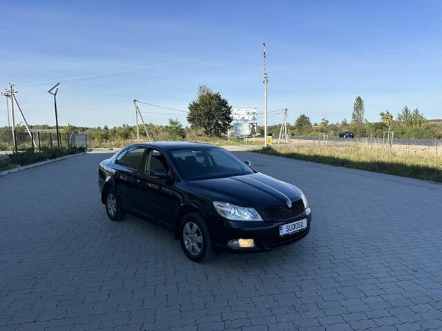 Черный Шкода Октавия, объемом двигателя 2 л и пробегом 237 тыс. км за 7600 $, фото 2 на Automoto.ua