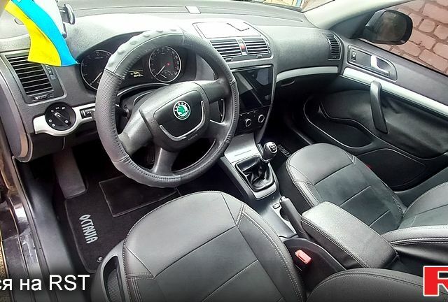 Черный Шкода Октавия, объемом двигателя 1.8 л и пробегом 205 тыс. км за 8500 $, фото 9 на Automoto.ua