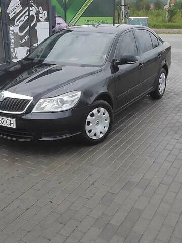 Шкода Октавия 2011 в Ужгороде на Automoto.ua Черный Шкода Октавия, объемом двигателя 1.6 л и пробегом 270 тыс. км за 7200 $, фото 2 на Automoto.ua