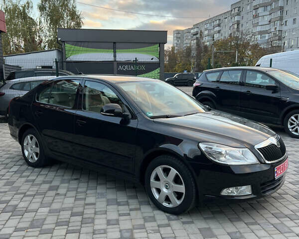 Шкода Октавія 2011 у Белой Церкве на Automoto.ua Чорний Шкода Октавія, об'ємом двигуна 1.4 л та пробігом 239 тис. км за 8300 $, фото 5 на Automoto.ua