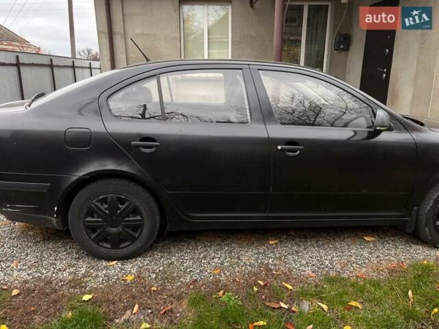 Черный Шкода Октавия, объемом двигателя 1.6 л и пробегом 204 тыс. км за 7800 $, фото 1 на Automoto.ua