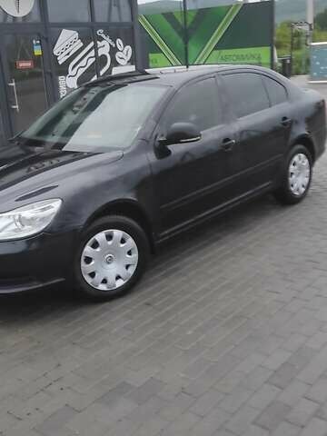 Шкода Октавия 2011 в Ужгороде на Automoto.ua Черный Шкода Октавия, объемом двигателя 1.6 л и пробегом 270 тыс. км за 7200 $, фото 7 на Automoto.ua